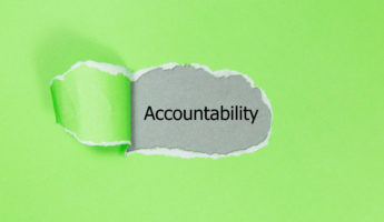 Accountability word written under torn paper.