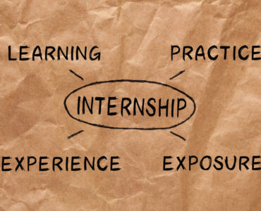 Internship drawing diagram with keywords on wrinkled paper. Business concept.