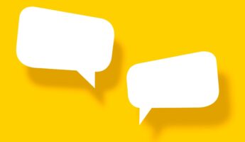 Empty white paper in speech bubble shape set against yellow background.